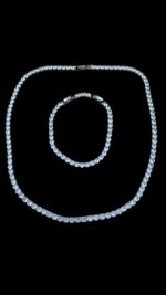 Set Bratara-Lant Tennis Gray Transparent confectionat din otel inoxodabil auriu, reglabil, de calitate superioara. Fabricate cu atenție la detalii și din materiale de cea mai înaltă calitate, aceste seturi adaugă o notă distinctivă oricărei ținute.